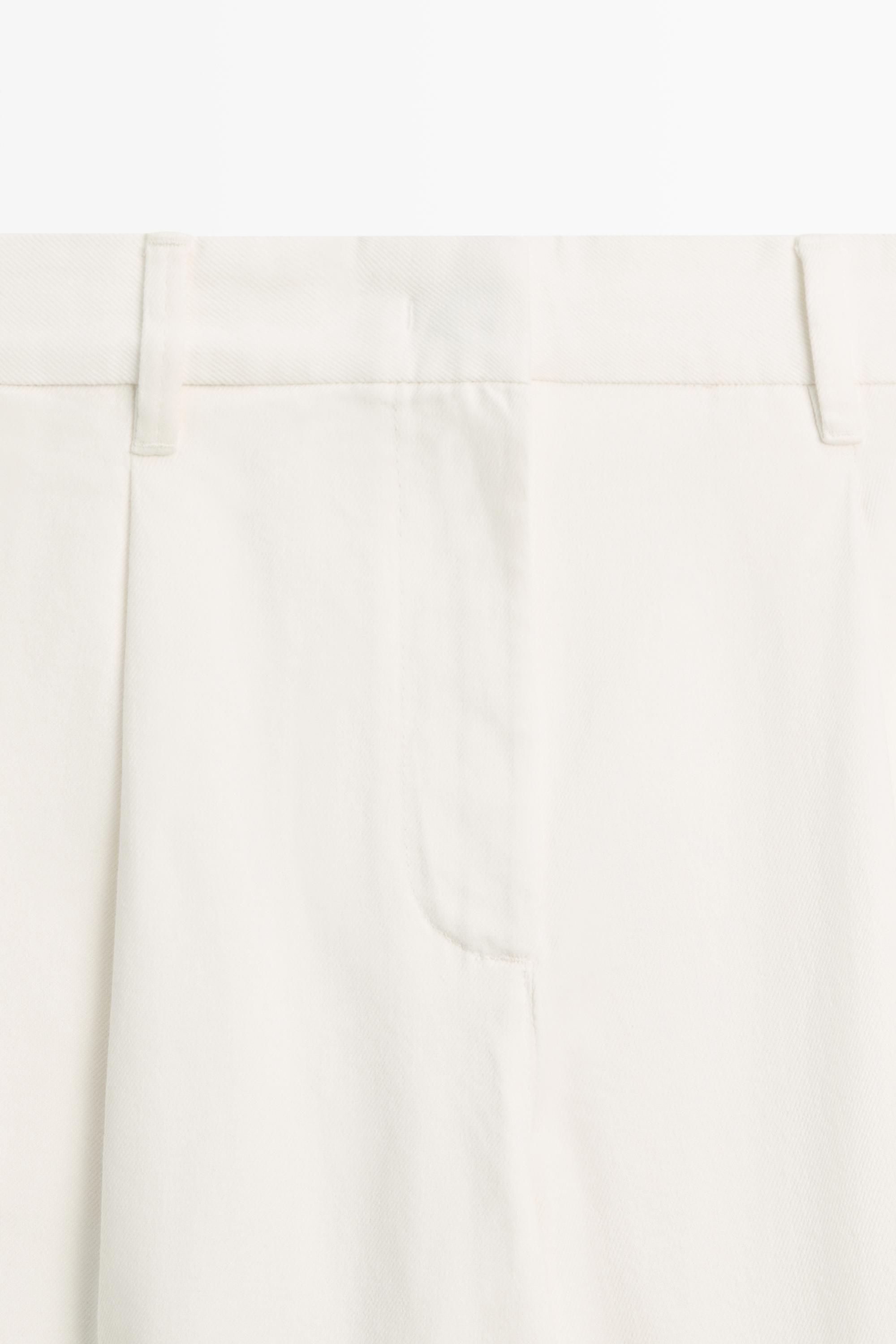 Pantalon wide leg taille basse à pinces